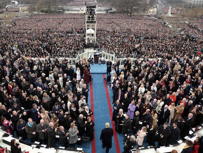 Donald Trump, centre, arrives for the swearing-in ceremony in front of the Capitol in Washington. Picture: AFP