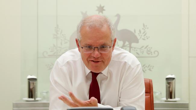 Prime Minister Scott Morrison talks with newly elected President of the United States Joe Biden on February 4. Picture: Adam Taylor