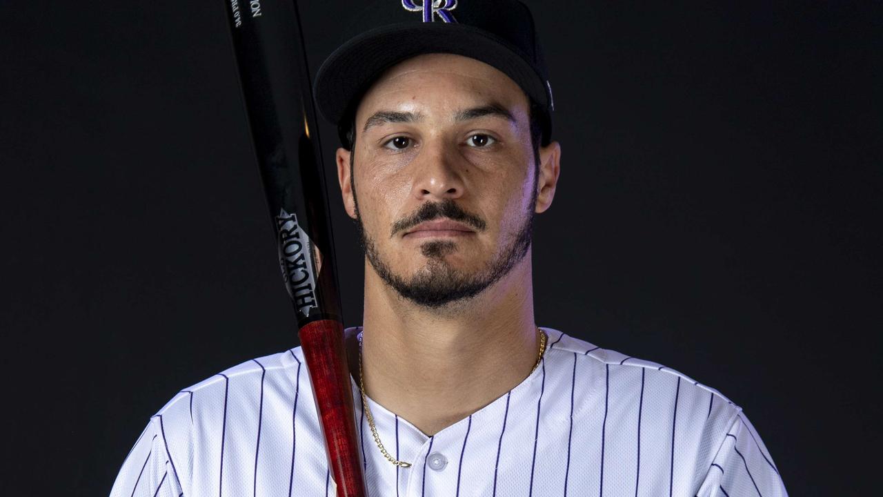 SCOTTSDALE, AZ - FEBRUARY 20: Nolan Arenado #28 of the Colorado Rockies poses during MLB Photo Day on February 20, 2019 at Salt River Fields at Talking Stick in Scottsdale, Arizona. Justin Tafoya/Getty Images/AFP == FOR NEWSPAPERS, INTERNET, TELCOS &amp; TELEVISION USE ONLY ==