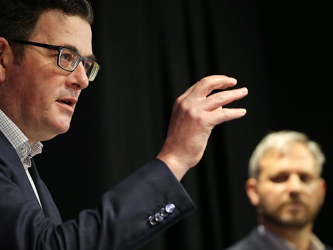 MELBOURNE, AUSTRALIA - NewsWire Photos AUGUST 18, 2020 : Victorian Chief Health Officer Professor Brett Sutton looks on as Victorian Premier Daniel Andrews announcing the latest coronavirus infection numbers across the state.Infections appear to be dropping but more deaths from COVID-19 are occurring in Aged Care. Picture : NCA NewsWire / Ian Currie