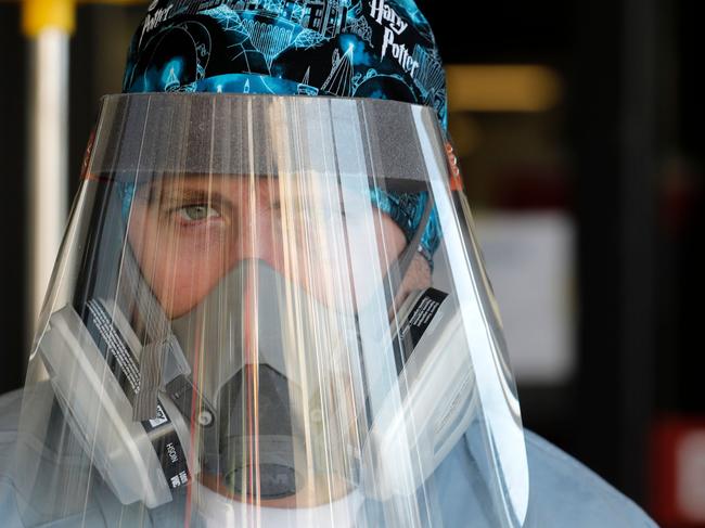 (FILES) In this file photo Canadian nurse Steve Homick is photographed outside of the Emergency Entrance at Beaumont Hospital in Royal Oak, Michigan on April 26, 2020. - Border restrictions were being tightened around the world on January 25, 2021 in the face of an unrelenting coronavirus threat, after a weekend in which anger at social distancing rules bubbled over into fiery clashes in the Netherlands. The United States was set to join France, Israel and Sweden in pulling up the drawbridge to certain arrivals, with special concern about new strains of the pathogen that originated in Britain and South Africa. (Photo by JEFF KOWALSKY / AFP)