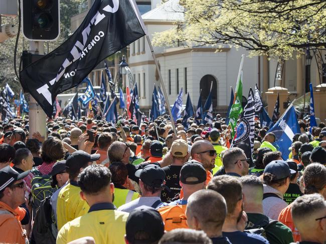 SYDNEY, AUSTRALIA - NewsWirePhotos -Tuesday, 27 August 2024:Furious union members pictured marching on NSW Parliament this week as part of a nationwide series of rallies protesting the Federal Government plunging the CFMEU into administration.Hundreds of supporters protesting on Macquarie Street over the move, which resulted in more than 270 union officials being axed from their roles on Friday morning.Picture:NewsWire/ Monique Harmer