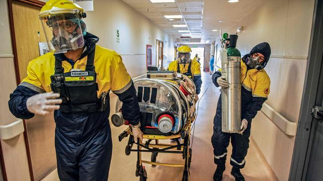 A Covid-19 patient is transferred to intensive care in Peru’s capital of Lima as the country battles a devastating outbreak. Picture: AFP