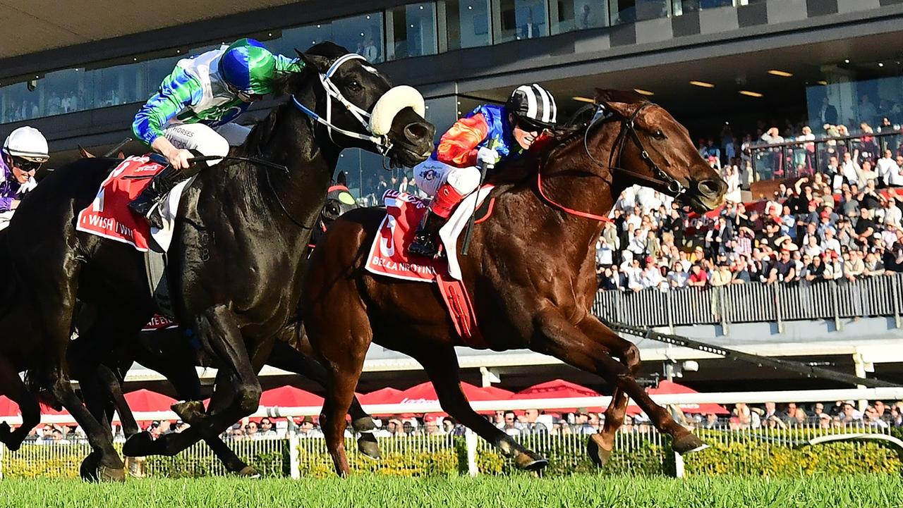 Bella Nipotina (Craig Williams) mows down I Wish I Win to win the Group 1 Doomben 10,000. Picture. Grant Peters / Trackside Photography