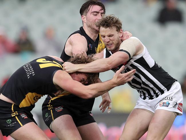 SANFL - Second Semi-Final - Glenelg v Port Adelaide, at Adelaide Oval. Tempers flare between Will Gould Liam McBean and Trent McKenzie  Picture SARAH REED