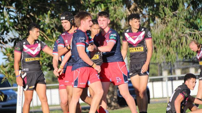 Redcliffe SHS celebrate a try.