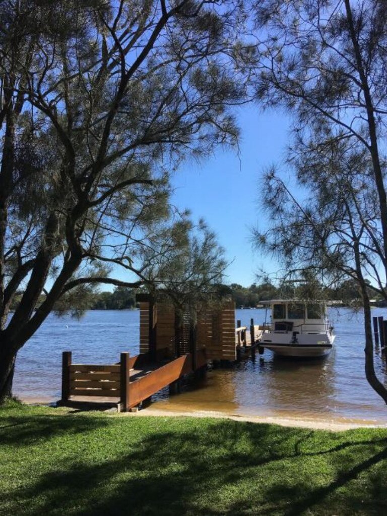 The new owners of this Noosa River jetty and houseboat will enjoy waking up on the waterfront to the remarkable sunrises. Picture: AirBNB.