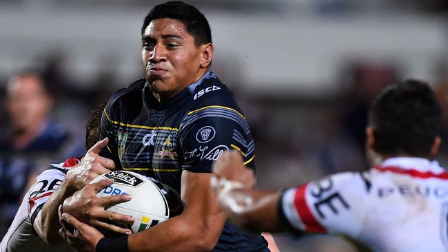 TOWNSVILLE, AUSTRALIA - MARCH 17: Jason Taumalolo of the Cowboys makes a break which leads to him scorimng a try during the round three NRL match between the North Queensland Cowboys and the Sydney Roosters at 1300SMILES Stadium on March 17, 2016 in Townsville, Australia. (Photo by Ian Hitchcock/Getty Images)