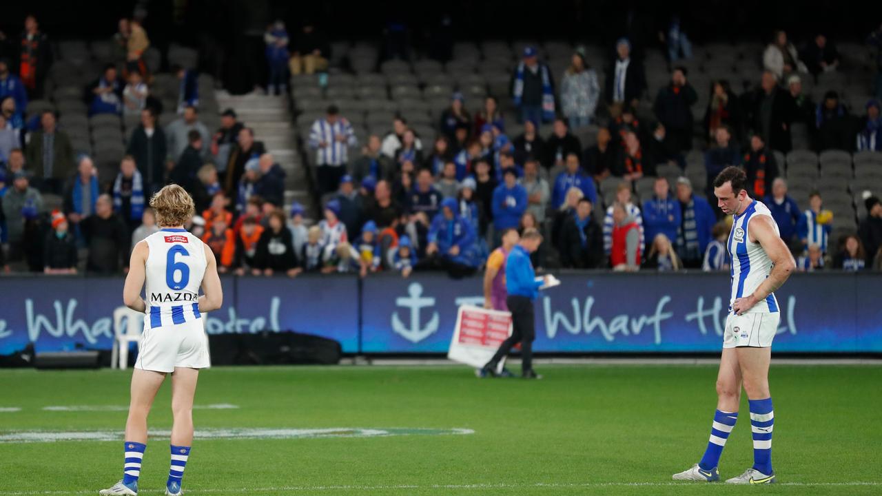 Jason Horne-Francis (left) and Todd Goldstein of the Kangaroos look dejected. (Photo by Michael Willson/AFL Photos via Getty Images)