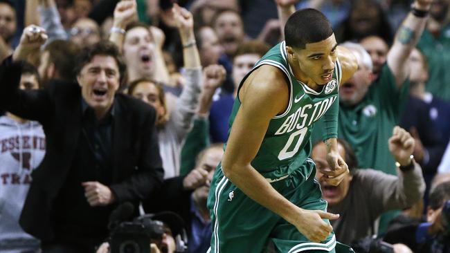 Boston Celtics owner Wyc Grousbeck, left, reacts to a Jayson Tatum three.