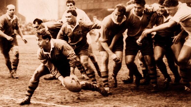 Ken Catchpole goes to pass during a Test match against England at Twickenham in 1967.