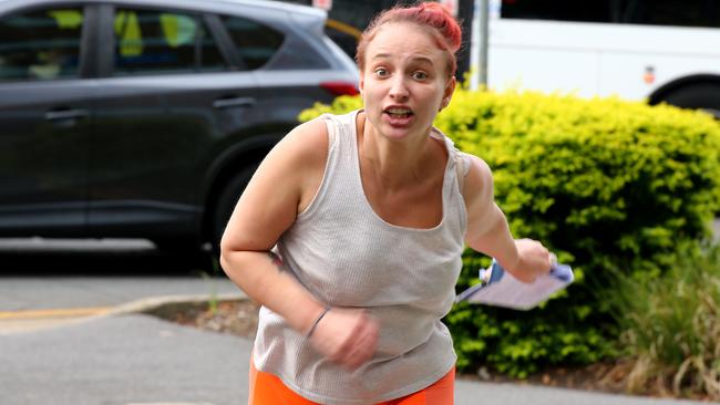 Crystal Marie Sawyer began lunging at photographers. Picture David Clark