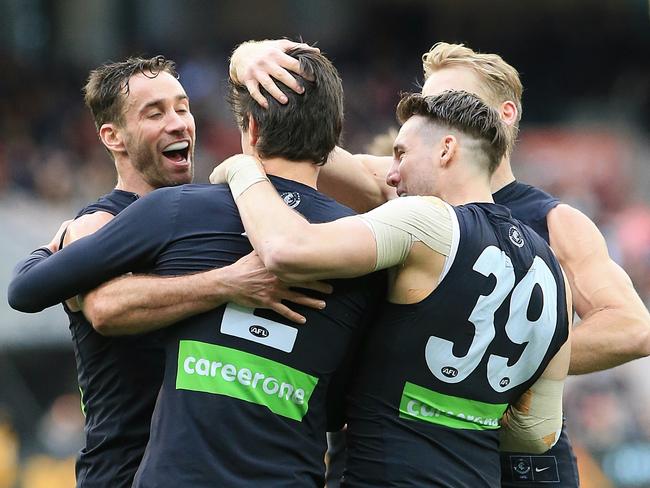 Jack Silvagni celebrates his first goal with teammates. Picture: Wayne Ludbey