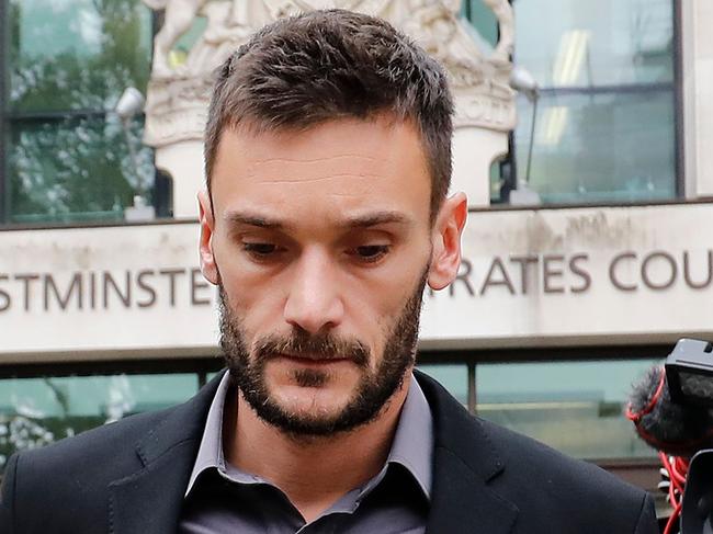 Tottenham Hotspur's French goalkeeper Hugo Lloris leaves after attending Westminster Magistrates Court in central London on September 12, 2018. - France's World Cup-winning goalkeeper Hugo Lloris avoided jail but received a 20-month driving ban and a £50,000 ($65,000) fine on Wednesday for drink-driving in central London. (Photo by Tolga AKMEN / AFP)