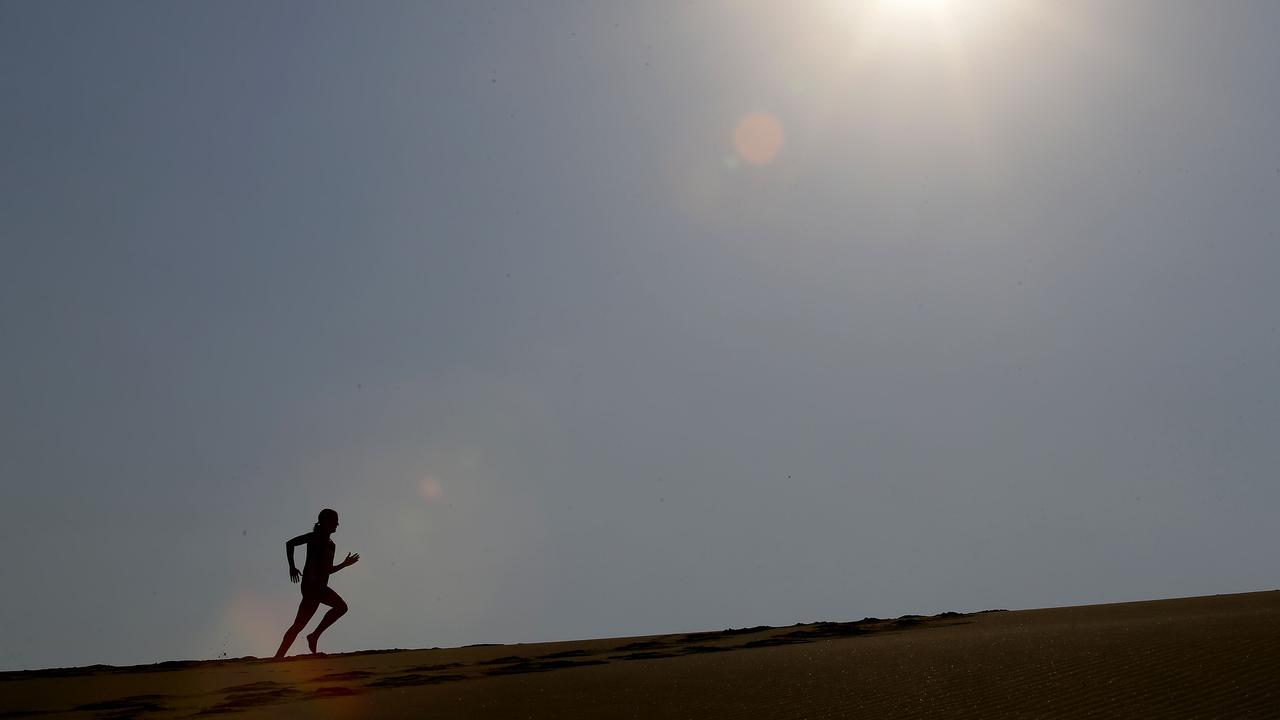 Wanda Beach: man charged with alleged naked run on sand dunes | Daily  Telegraph