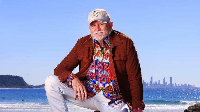 Celebrity photographer, artist and fashion designer Adam Parsell in one of his signature shirts at Currumbin Alley. Picture: Adam Head