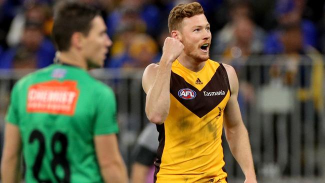 Tim O'Brien celebrates one of his four goals in Hawthorn’s superb win.