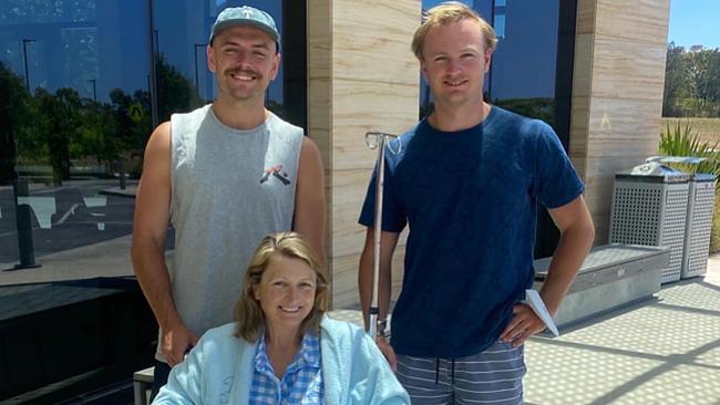 Tom and Mike Mortimer with mother Jackie just before she was discharged from hospital. Picture: Supplied.