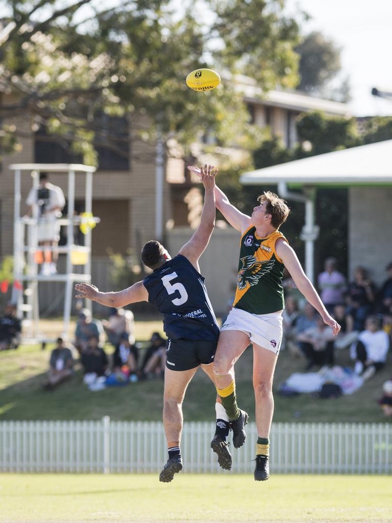 Timothy Lewis (left) of Coolaroo and William Rogers of Goondiwindi Hawks in AFL Darling Downs Allied Cup senior men grand final at Rockville Park, Saturday, September 2, 2023. Picture: Kevin Farmer