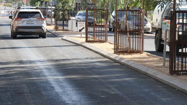 ‘Bitumen bleed’ is being labelled as the reason recently resurfaced Hartley St, Alice Springs, is shut to buses and cars are not allowed to park on the road. Picture: Gera Kazakov