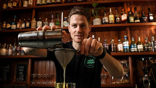 Malt &amp; Juniper’s managing partner Matt Holding mixes a drink. Picture: AAP/Mike Burton