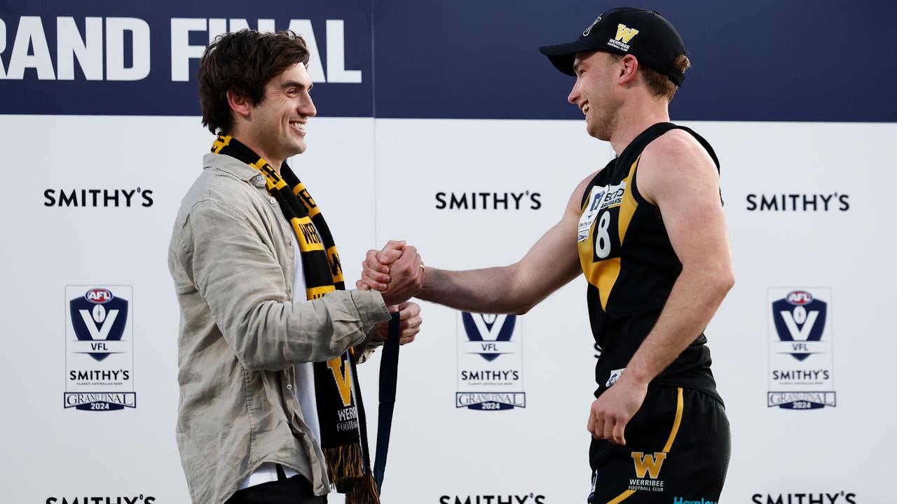 Shaun Mannagh presents Jack Henderson of the Tigers with the Norm Goss Memorial Medal during the 2024 VFL Grand Final. Photo by Michael Willson/AFL Photos via Getty Images