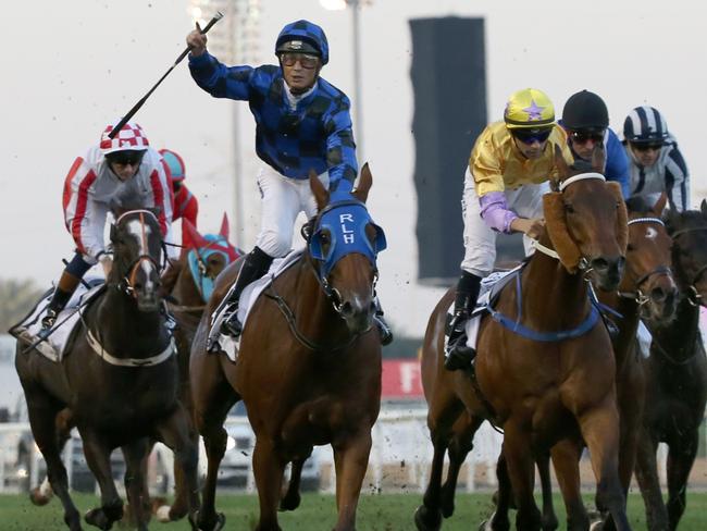 Damian Browne celebrates as Buffering wins the Al-Quoz Sprint in Dubai. Picture: AFP