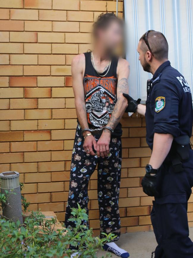 Police arrest a man at the scene. Picture: NSW Police