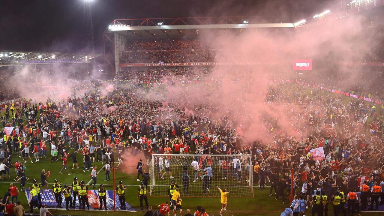 Notts Forest fans invade the pitch. Photo by Michael Regan/Getty Images.