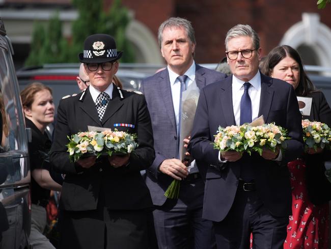 British Prime Minister Sir Keir Starmer left a floral tribute to the child victims. Picture: Getty Images