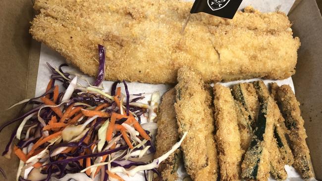 Keto fish and chips from new Miami fish and chip shop The Jolly Roger – almond meal crumbed fish and zucchini chips with salad.