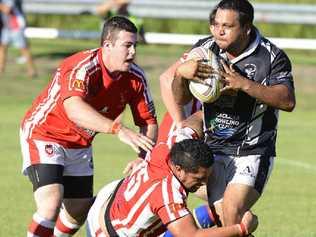 TACKLE TIME: South Grafton Rebels defenders converge on Lower Clarence’s Travis Gibson during their trial match at Maclean Showground on Saturday. Photo: Debrah Novak