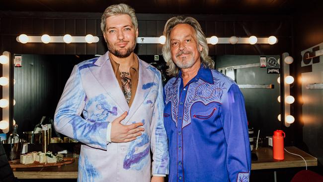 Concert promoter and CMC Rocks QLD music festival director Jeremy Dylan (left) with American singer-songwriter Jim Lauderdale (right), backstage at The Factory Theatre in Sydney. Picture: Ruby Boland