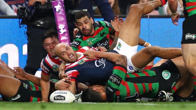 Blake Ferguson of the Roosters scores a try.