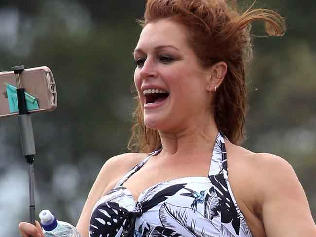 ONE TIME WEB USE ONLY - FEE APPLIES FOR REUSE -  EXCLUSIVEFormer model Tziporah Malkah is seen using a selfie stick on a New South Wales beach to capture her remarkable 50kg weight loss.MUST CREDIT DIIMEX.COM,13-May-2019,AUSTRALIA,EXCLUSIVE Tziporah Malkah captures 50kg weight loss with selfie stick 21  Picture: Diimex