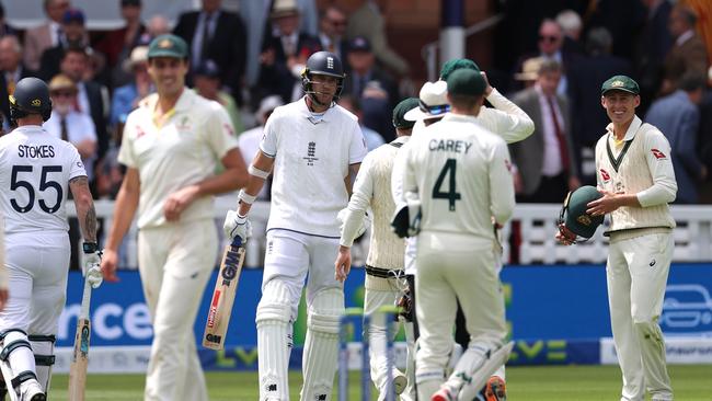 Stuart Broad and David Warner exchanged words after the tense first session. Picture: Getty