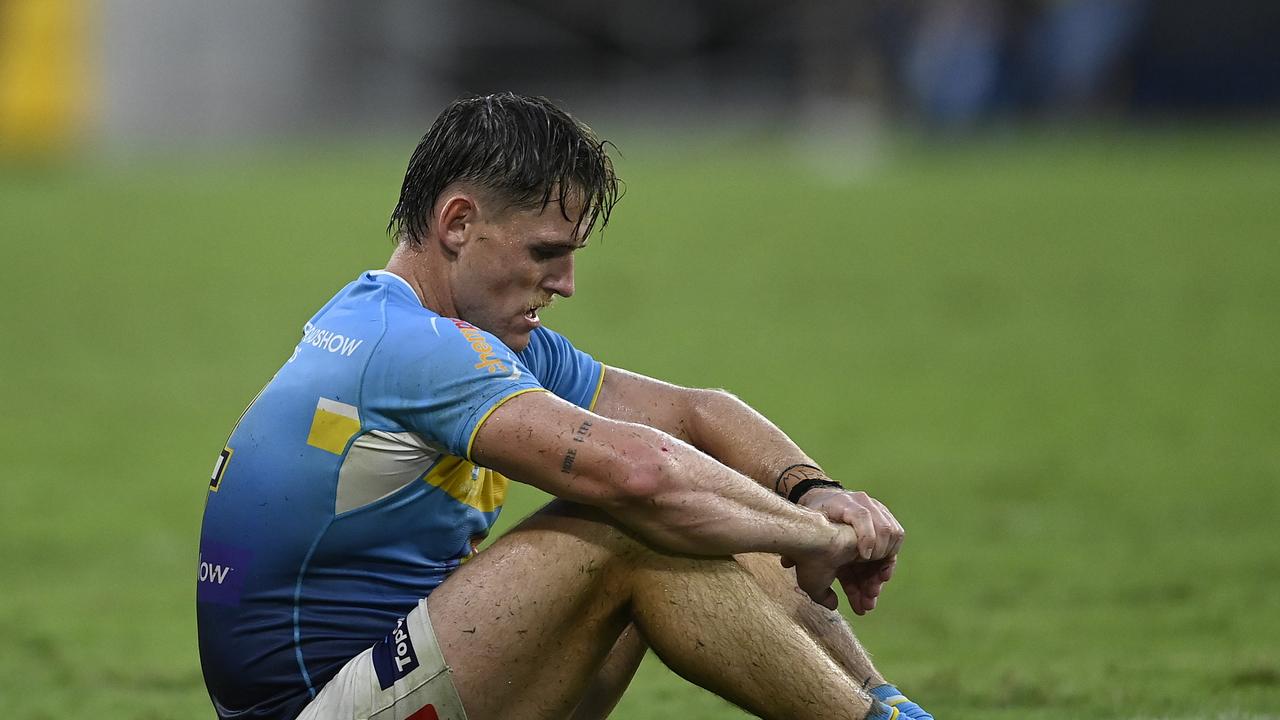 TOWNSVILLE, AUSTRALIA - APRIL 07: AJ Brimson of the Titans looks dejected after losing the round five NRL match between North Queensland Cowboys and Gold Coast Titans at Qld Country Bank Stadium, on April 07, 2024, in Townsville, Australia. (Photo by Ian Hitchcock/Getty Images)
