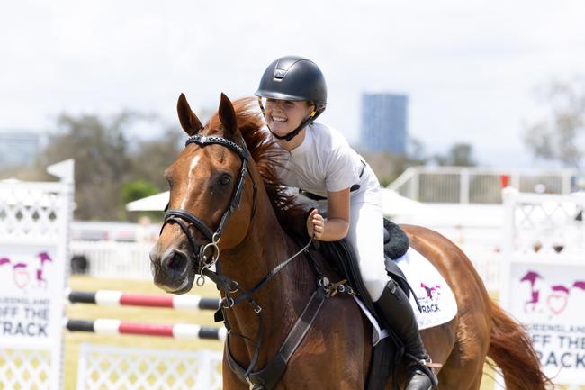 Makaylah Fenwick wins the Off The Track Cup at the Magic Millions Showjumping and Polo. Picture by Luke Marsden.