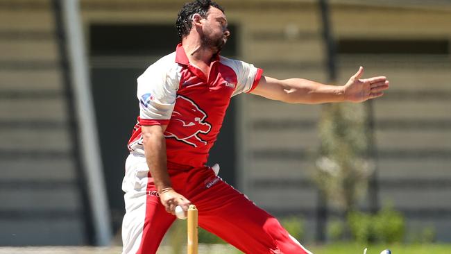 Melton coach Brad Jones bends his back. Picture: Hamish Blair