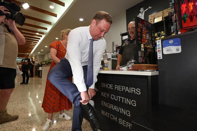 Queensland State Election coverage with the Queensland Premier Steven Miles. Steven visits Caneland Central where Scott Mauchline from Mister Minit cleans the Premiers shoes. Pics Adam Head