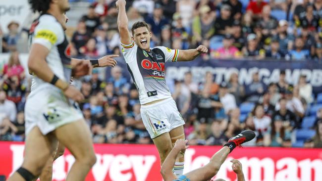 Nathan Cleary of the Panthers (centre) celebrates after kicking a golden point field goal during the Round 22 NRL match between the Gold Coast Titans and the Penrith Panthers at Cbus Super Stadium on the Gold Coast, Saturday, August 11, 2018. (AAP Image/Glenn Hunt) NO ARCHIVING, EDITORIAL USE ONLY