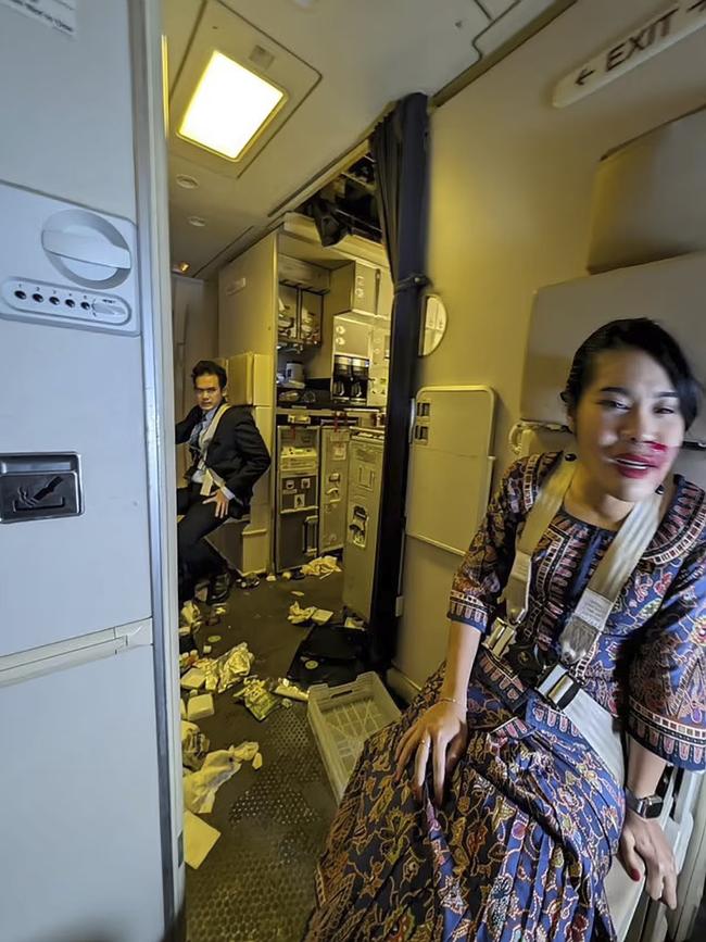 Injured Singapore Airlines’ crew after severe turbulence on flight SQ321.