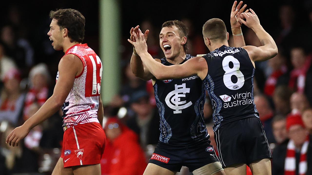 Patrick Cripps and Lachie Fogarty celebrate during last year’s clash with Sydney. Picture: Cameron Spencer/Getty Images