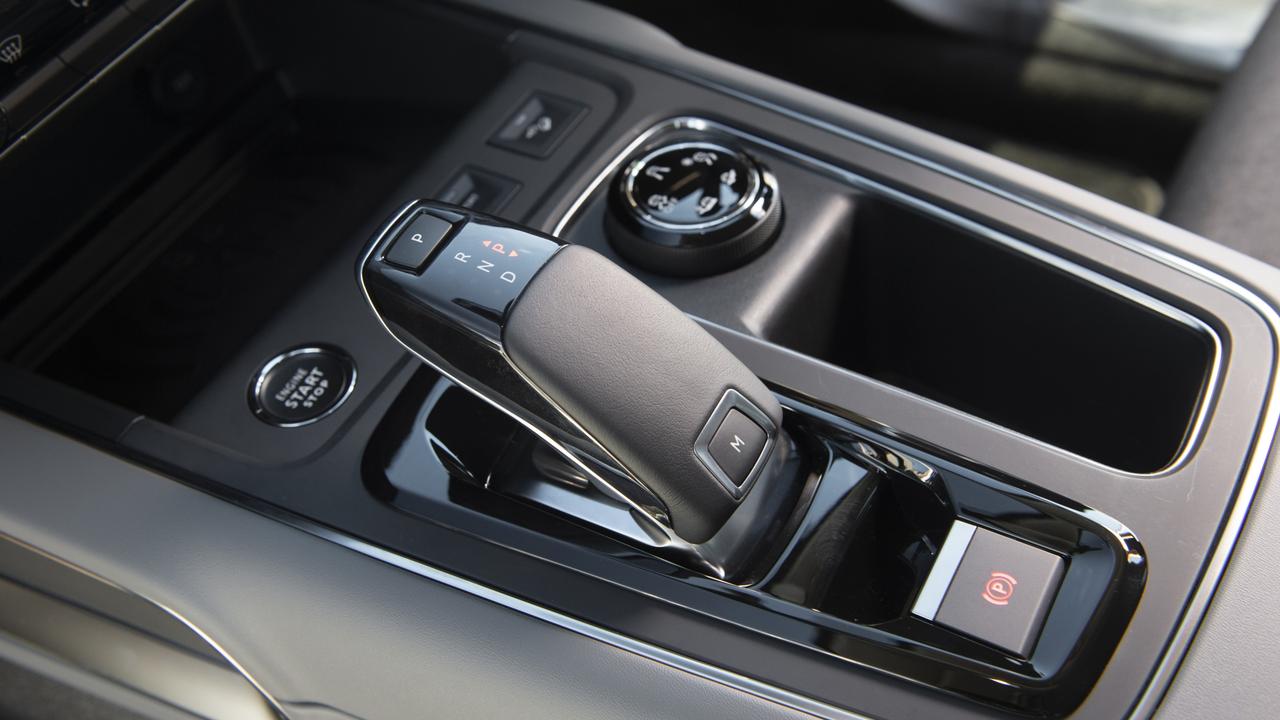 The drive selector is similar to compact ones used in BMWs.