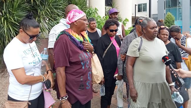 Nathaniel Wailu's family gather outside the Cairns Courthouse after the verdict was announced. His sister Kay speaks to media. Picture: Andrew McKenna