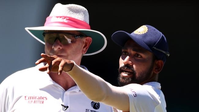 Mohammed Siraj making a formal complaint to umpire Paul Reiffel. Picture: Cameron Spencer/Getty Images