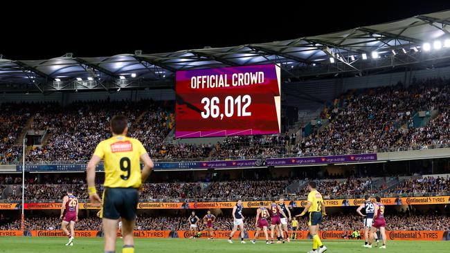 The official attendance of 36,012 is displayed on the big screen during the 2023 AFL preliminary final match between the Brisbane Lions and the Carlton Blues at the Gabba. Picture: Dylan Burns/AFL Photos via Getty Images.