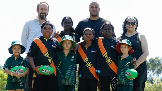 AFL Northern Territory CEO Sam Gibson, Lance Buddy Franklin and AFL EGM Inclusion and Social Policy Tanya Hosch pose for a photograph with students from Anula Primary School and the Michael Long Learning and Leadership Centre. Picture: Michael Willson/AFL Photos)