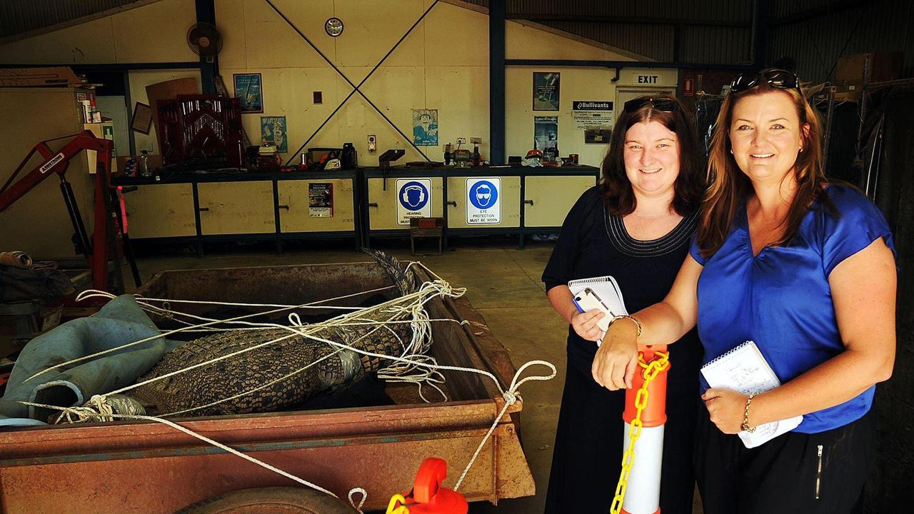 Chronicle reporter Carlie Walker and former photographer Valerie Horton with the reptile dubbed "Mary Croccins (she turned out to be a he)". The croc was captured near the Lamington Bridge in 2013.