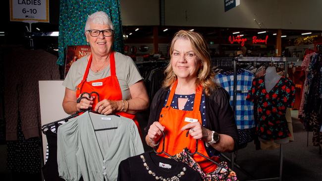 Op-shop volunteers Lorraine Johnson and Jill Webb with items for sale at the Hobart City mission Op Shop in Moonah. Picture: Linda Higginson